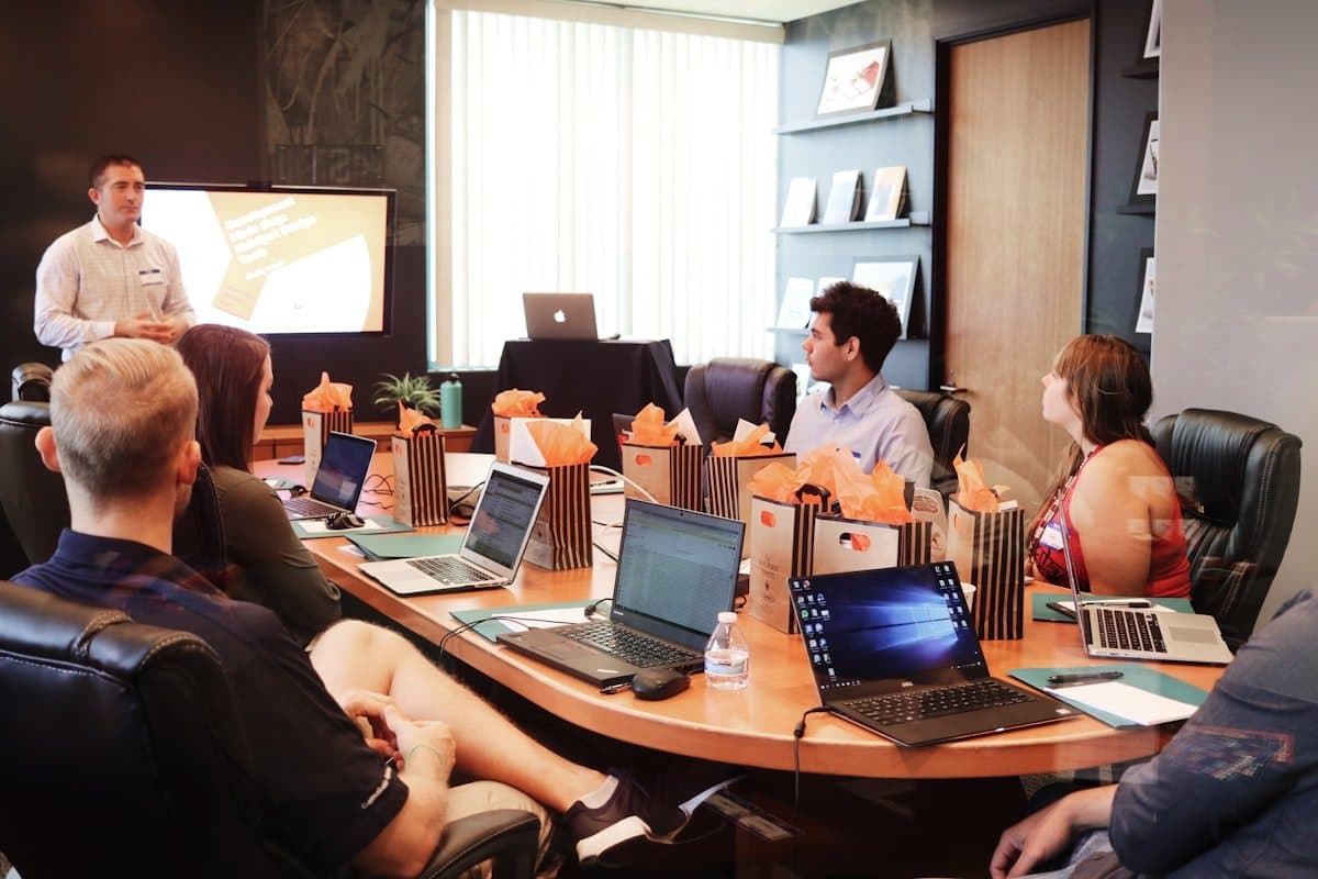 A marketing workshop around a meeting table
